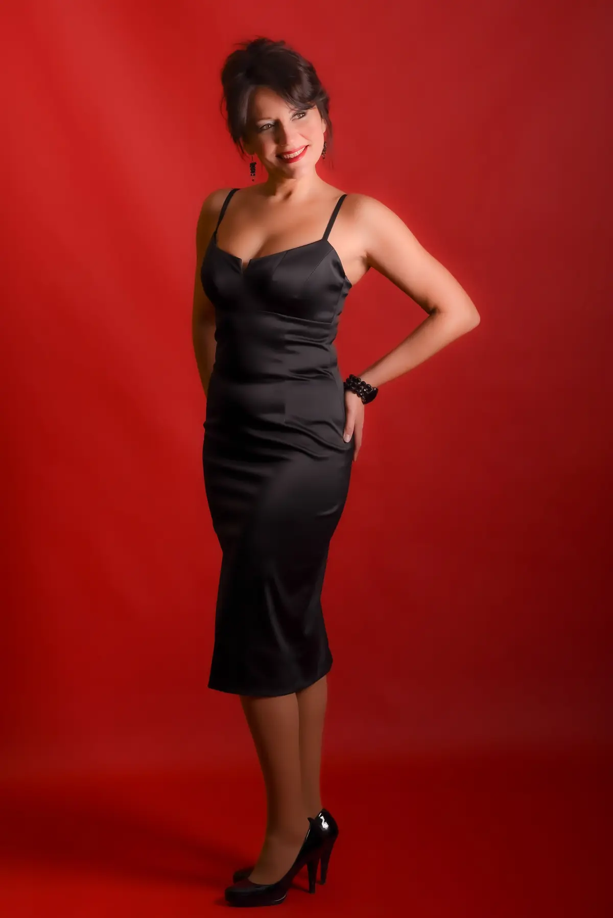 Illustrative stock photograph of an elegant mature female model in a Los Angeles-style studio